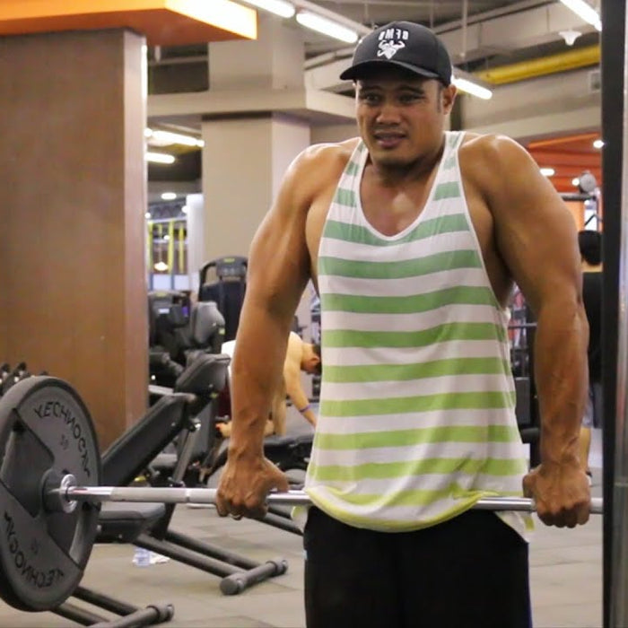 How to Perform a Barbell Shrug | Workout Guide